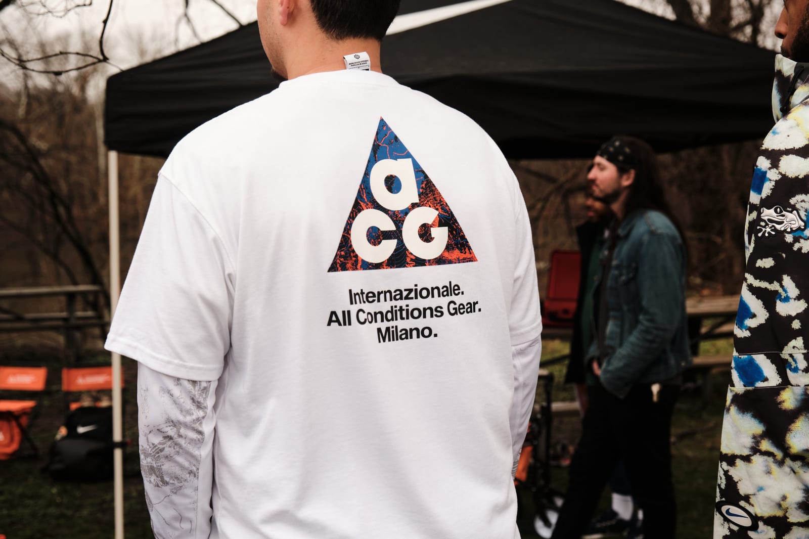 The back of an ACG jacket under a black tent