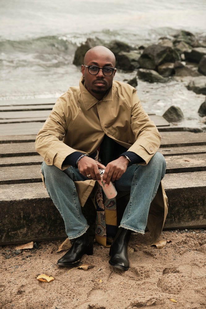 Sitting on the boardwalk steps with the water behind