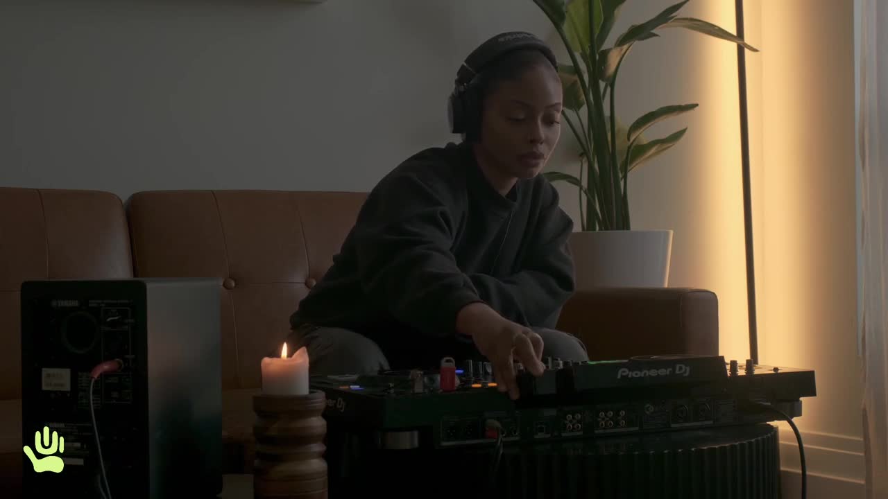 OH LEI at the decks in a lamp lit room